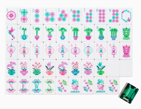 <p>Deep emerald green layers with crisp white faces and intricate florals.</p>