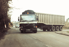 <p>What should you do as you approach this lorry?</p>
