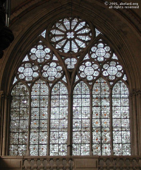 <p>White glass painted with gray designs.</p>
