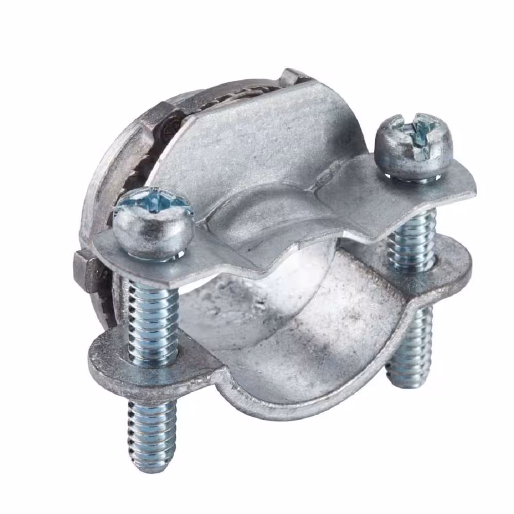 <p>Screw-tightened bracket used to secure non-metallic (NM) electrical cable to a junction or outlet box, providing strain relief and cable protection.</p>