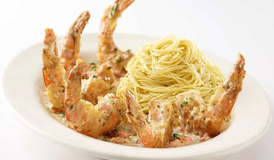 <p>Paris Bistro-Style! Sauteed with Whole Cloves of Garlic, White Wine, Fresh Basil and Tomato. Served with Angel Hair Pasta</p>