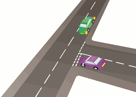 You're waiting at a T-junction. What should you do if a vehicle is coming from the right, with its left indicator flashing?
