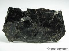 <p>dark brown/black, soft, white streak, sheets</p><p>Use: electrical/thermal insulation, glitter, rock-forming mineral</p>