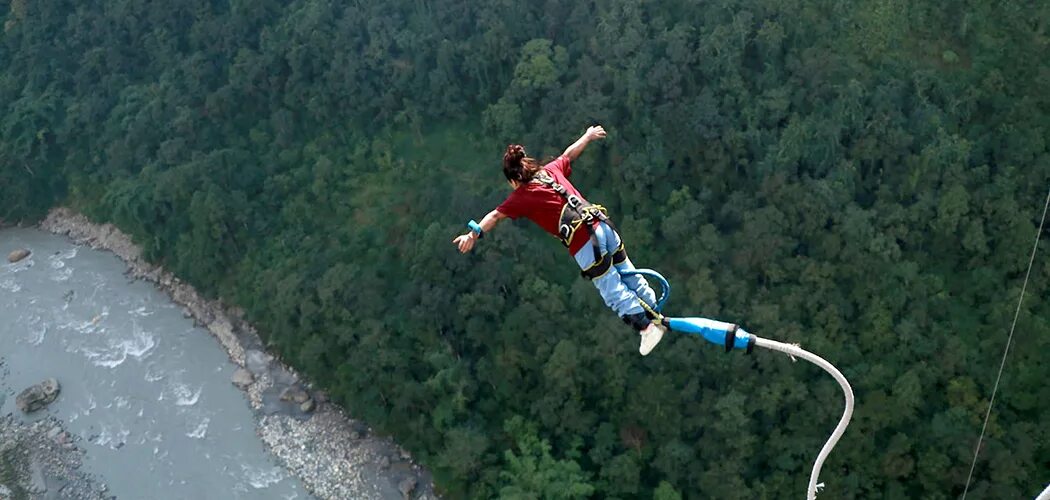 <p>Jumping from a height attached to an elastic cord</p>