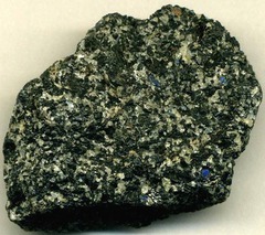 <p>low silica content - dark colored</p>