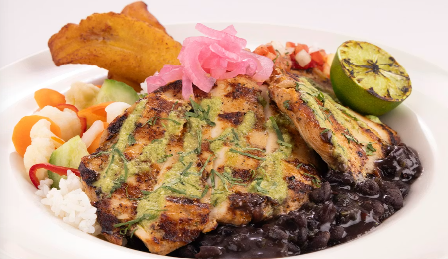 <p>Charbroiled Chicken with Black Beans, Plantains and Salsa, Served with White Rice</p>