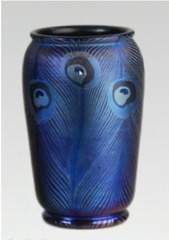 <p>Tiffany, Art Noveau, feathers geometrically idealized as ovals and concentric</p>