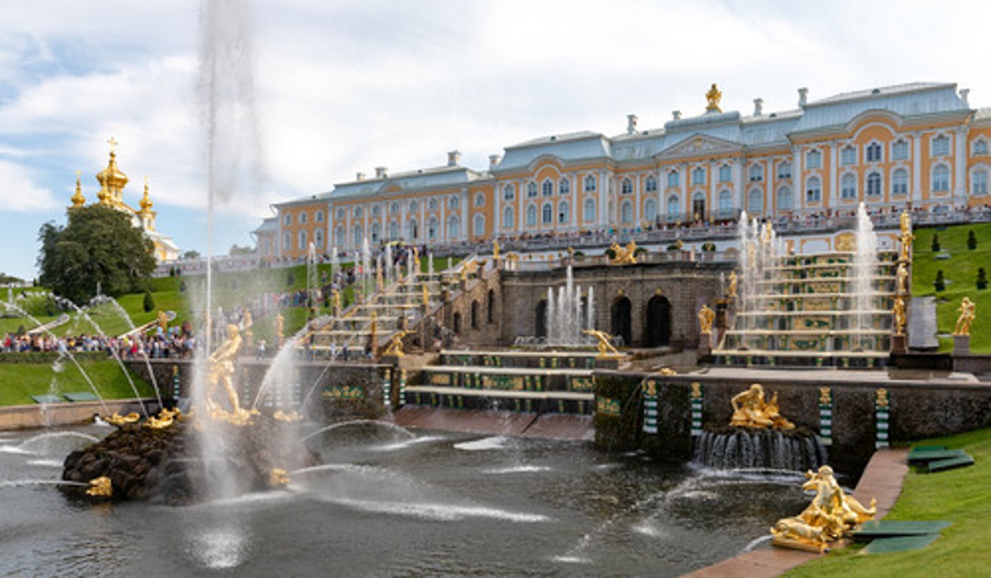 <p>TRANSLATION: Петергоф</p><p>DEFINITION: A series of palaces and gardens located in Peterhof, Saint Petersburg, Russia, laid out on the orders of Peter the Great, often called the "Russian Versailles".</p><p>EXAMPLE: The most famous thing about .................. is its beautiful golden fountains. Самая известная особенность ПЕТЕРГОФА — его красивые золотые фонтаны.</p>