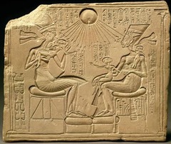 <p>this sunken relief, the Amarna artist provided a rare intimate look a the royal family in a domestic setting; Akhenaton, Nefertiti, and three of their daughters bask in the life-giving rays of Aton, the sun disk</p>