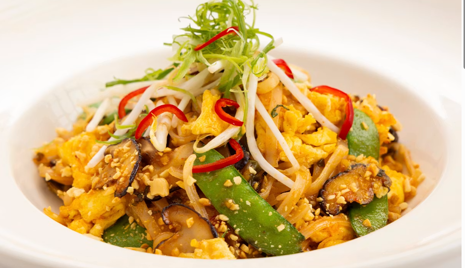 <p>Asian Rice Noodles, Snow Peas, Shiitake Mushrooms, Bean Sprouts, Green Onion and Egg with Cilantro and Chopped Peanuts</p>