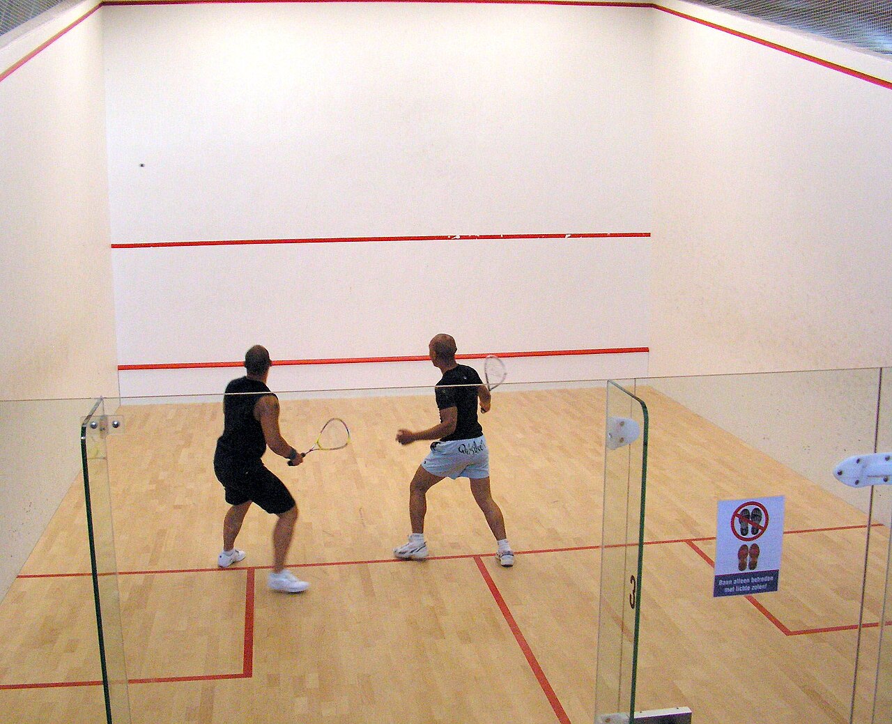 <p>A racket sport played against walls</p>