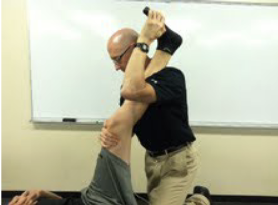 <p><strong>Hamstring Syndrome Provocation Test</strong></p><ul><li><p><strong>How:</strong> Pt in supine and examiner stands to the side being tested. Flex the <strong>hip to 80–90°</strong>, extend the <strong>knee to ~15°</strong>, dorsiflex the ankle, then ask the patient to <strong>resist knee flexion</strong>.</p></li><li><p><strong>Positive:</strong> <strong>Reproduction of the patient's familiar buttock or posterior thigh pain</strong>, suggesting <strong>sciatic nerve compression/entrapment</strong>.</p></li></ul><p><strong>What other test would be positive with hamstring syndrome?</strong></p><ul><li><p><strong>Straight Leg Raise (SLR)</strong> – <strong>must also be positive</strong> to support a diagnosis of <strong>true hamstring syndrome</strong>. If the SLR is negative, think <strong>hamstring contractile tissue pain</strong> rather than sciatic nerve entrapment.</p></li></ul><p></p>
