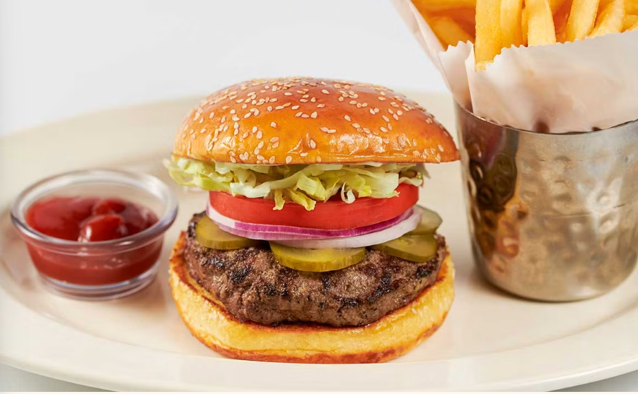 <p>Charbroiled on a Toasted Brioche Bun Topped with Lettuce, Tomato, Onion, Pickles and Mayonnaise</p>