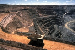 <p>the act of extracting ores or coal etc from the earth</p>