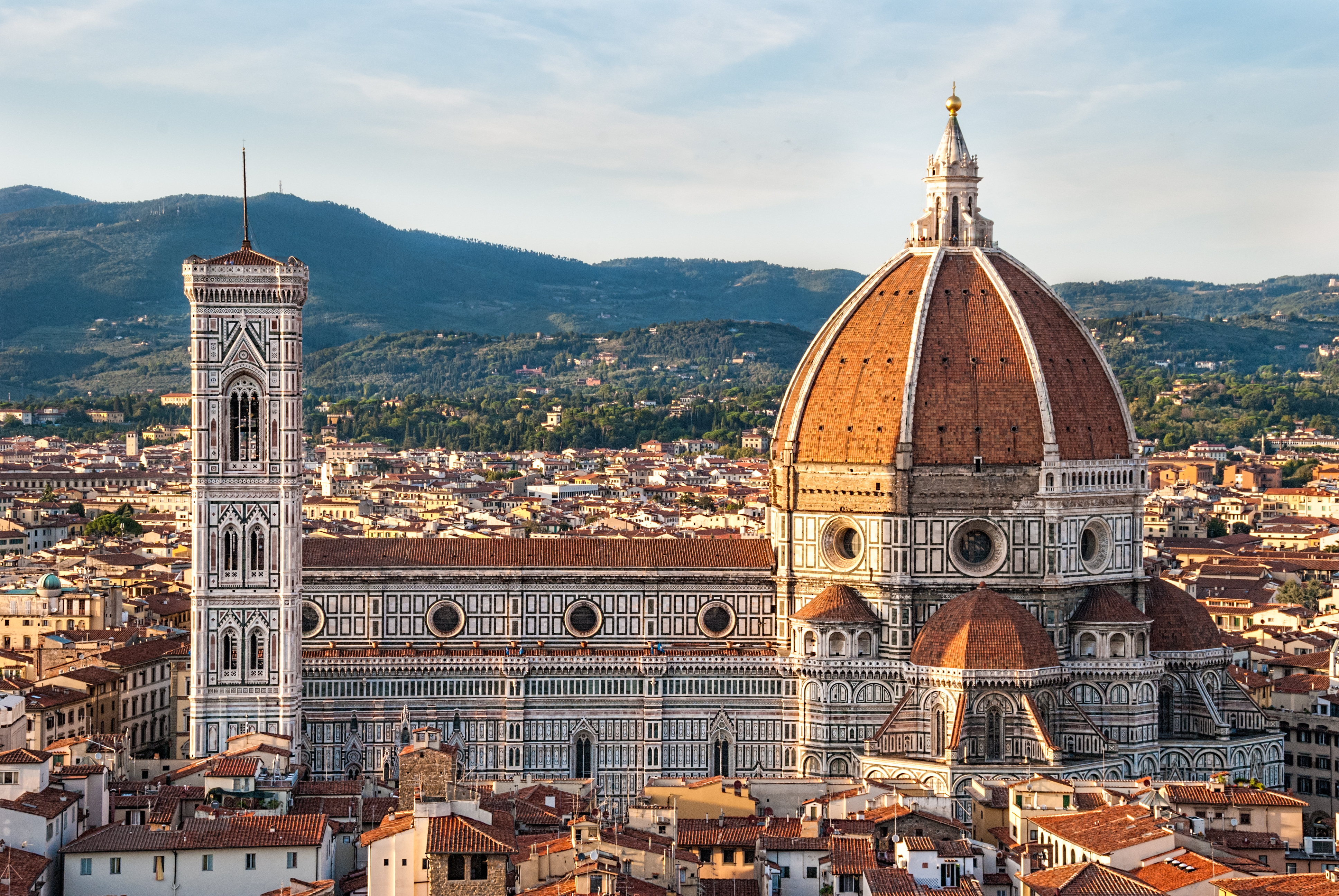 <p>main early Renaissance cathedral, demonstrates humanism by size, Greco-roman simplicity, marble facade and dome (like Pantheon) designed by Brunelleschi, Campanilla del Fiore (belltower) designed by Giotto, Baptistria del Fiore = baptistry</p>