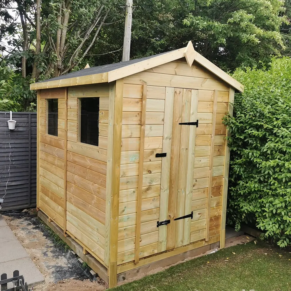 <p>casita donde guardas herramientas usualmente en el jardín </p>