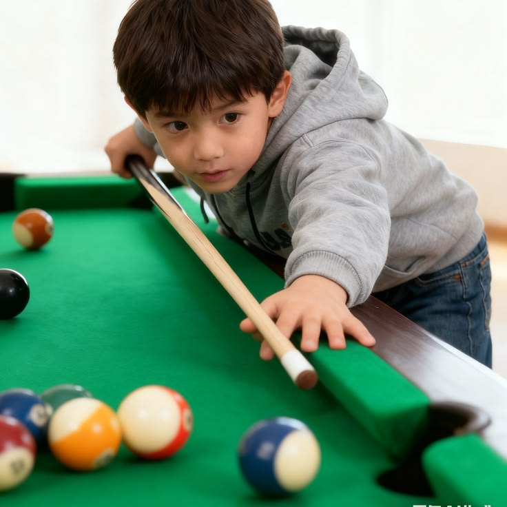 <p>a long stick used to hit balls in snooker, pool or billiards. He chalked his ___ before the shot.</p>