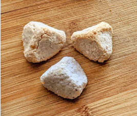 <p>Chewy coconut cookie with crunchy exterior and soft inside. Raspberry coconut meringue. GF</p>