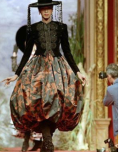 <p>Designer known for baroque, theatrical, and highly decorative fashion</p>