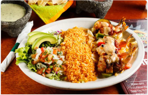 <p>(5) Jumbo brochette shrimp stuffed with Jack cheese and jalapeno. Wrapped in bacon and smothered in our delicious butter chipotle sauce. Served with rice and your choice of beans.</p>